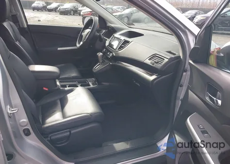 2016 Honda Cr-V Touring z USA, uszkodzony, nr VIN 5J6RM4H96GL119261